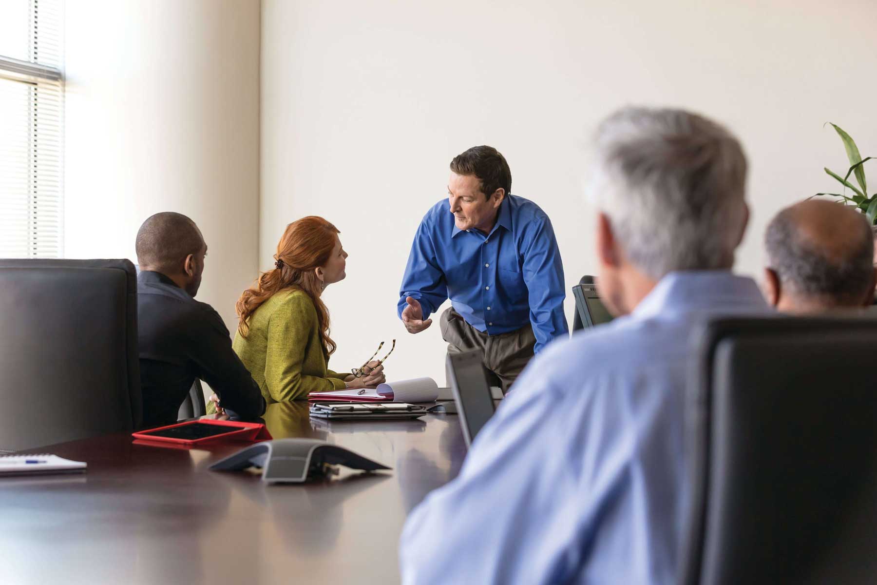 Executive leadership team in a governance meeting